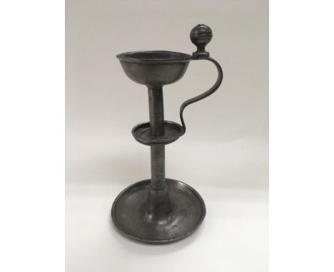 An early Victorian pewter whale oil lamp, approx 23cm.