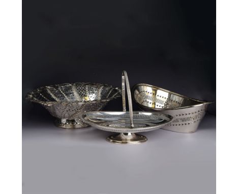 Old Sheffield plate pierced bowl, of oval form with embossed floral rim and wheat sheaves to side, together with a silver pla