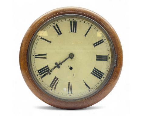 Late 19th century 12” wall clock in a mahogany case with a spring driven movement.