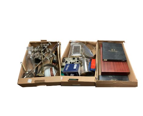 Collection of metal ware including silver plate wine cooler, tray candlesticks and other collectables, in three boxes 