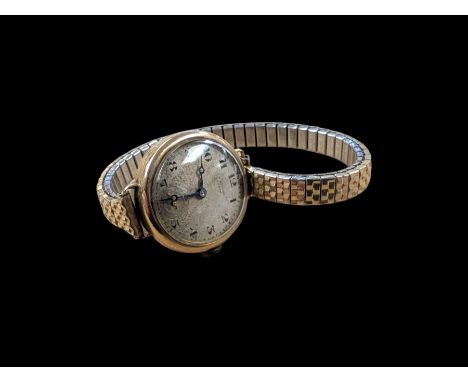9ct gold cased manual wind wristwatch by JW Benson, on base metal expanding strapCondition Report:Gross (inc. movement and st