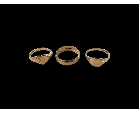 Two 9ct gold signet rings and a 9ct gold wedding band, all hallmarkedCondition Report:Approx 7.2 grams, wedding band with per