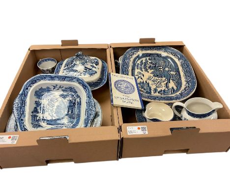 Collection of Willow pattern dinnerware's, including covered dish, serving platter, jugs etc, in two boxes  