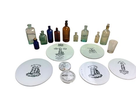 Five ceramic advertising scale weight plates, together with two pot lids and a collection of glass bottles 