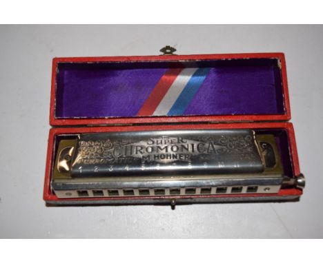 A Super Chromonica Hohner harmonica 