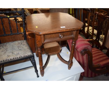 A Dutch style oak two tier lamp table 