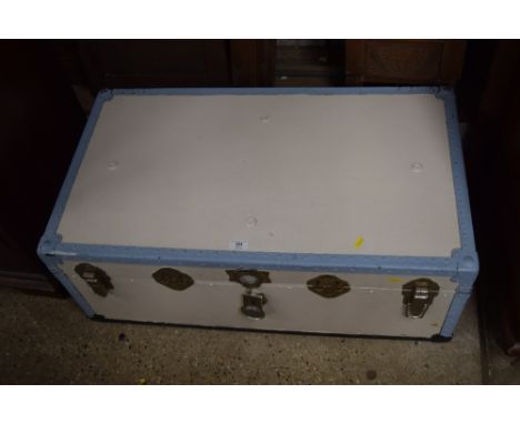 A blue and white painted travelling trunk 