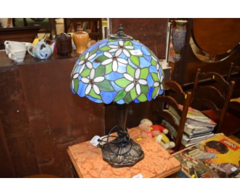 A Tiffany style table lamp and shade 