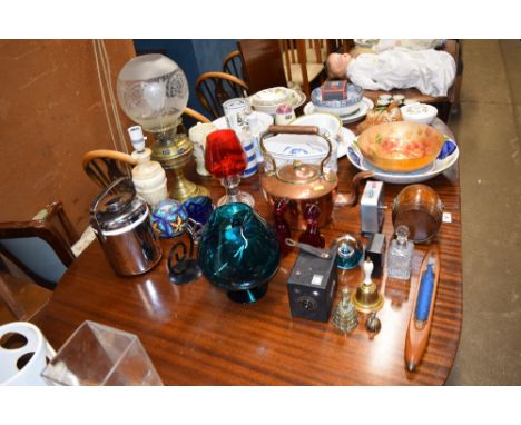 A brass oil lamp; a copper kettle; a large green glass goblet; three glass paperweights etc.