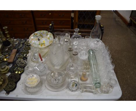 A quantity of various glassware to include a mottled glass shade, a rolling pin, decanters, drinking glasses etc. 