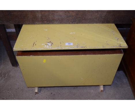 A small painted wooden storage box containing an wooden lamp base etc. 