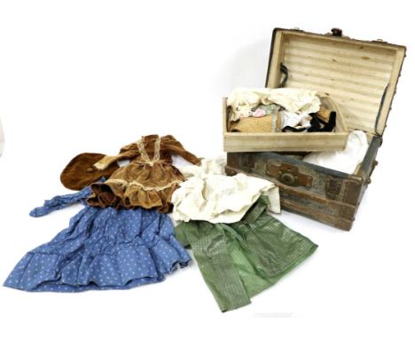 Late 19th Century Dolls Domed Hinged Trunk, covered with blue canvas, brass mounts, American Eagle locks, wooden baton mounts