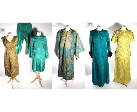 Possibly Indian Early 20th Century Turquoise Silk Robe, woven with  gilt threads in a stylish design, pink trims to the insid