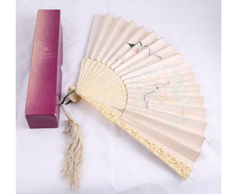 A 19th Century Ivory Fan, delicately carved with flower heads to the guards and Chinese figures to the guards, with a cream s