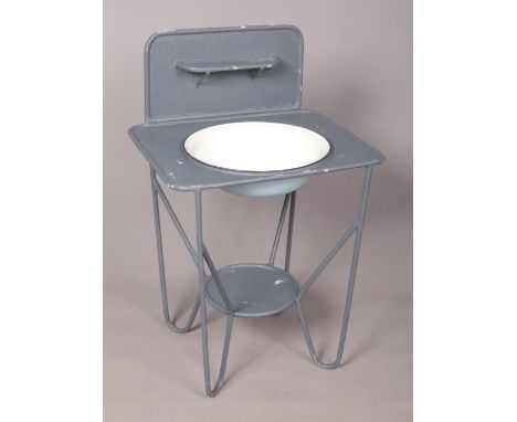 A painted tubular metal wash stand with an enamel removable basin. H: 95cm, W: 62cm.  