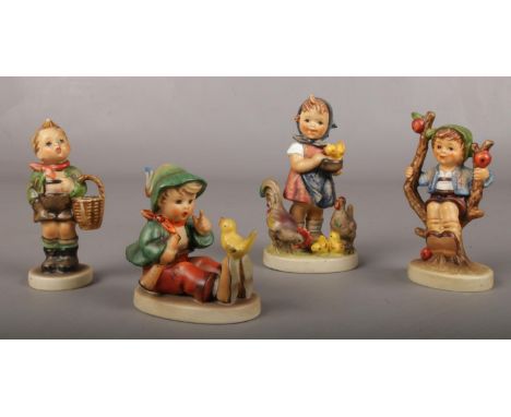 Four Goebel ceramic figures.  Good condition.