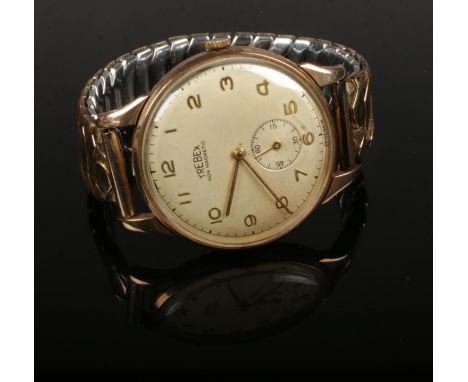 A Gents Trebex 9ct gold cased presentation manual wristwatch with expanding strap.  Overwound. Inscription to the reserve.
