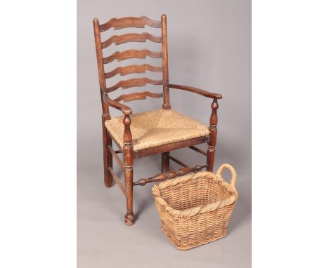 A vintage ladder back wicker chair. (106cm height 56cm width, 47cm depth) To include wicker basket.  