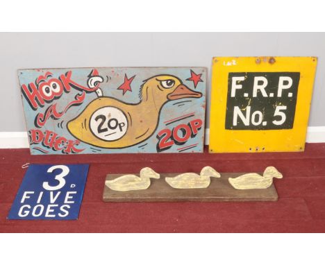 A wooden duck shooting target, together with three signs. Comprising of a 'Hook a Duck' plywood fun-fair sign and an enamel F