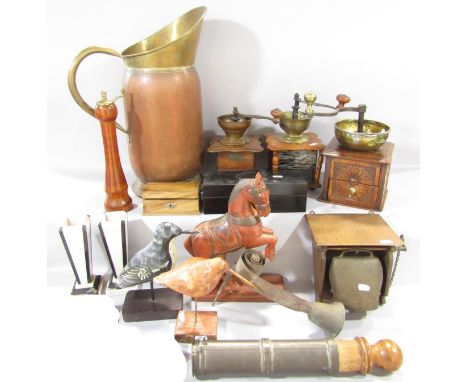 A miscellaneous collection of items including, a large copper and brass jug, three coffee grinders, a pepper grinder, shop do