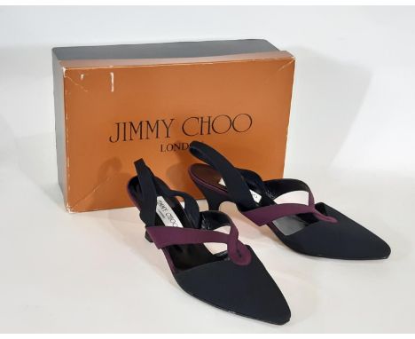 A pair of Jimmy Choo ladies shoes size 6.5 with black textile upper, purple detailing, sling back and 7cm kitten heel. Signs 
