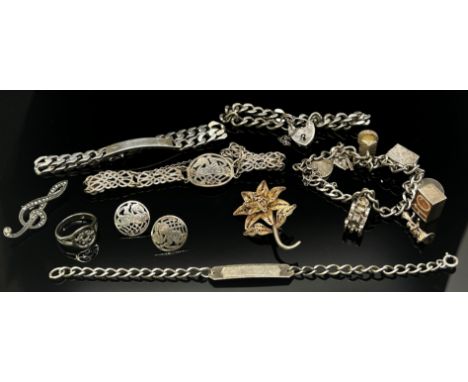 Mixed group of silver jewellery to include a curb link charm bracelet with heart padlock clasp, a further similar bracelet, t