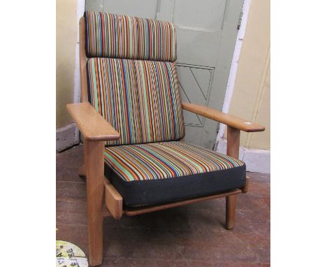 Hans Wegner (Danish) A ‘Getama GE 290’ model armchair in oak with bright parallel striped upholstery. 