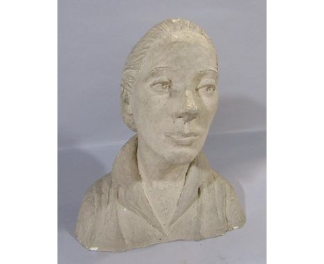 A fired clay bust of a woman, hair tied back in a bun and an open neck blouse, 24cm wide x 27cm high. 