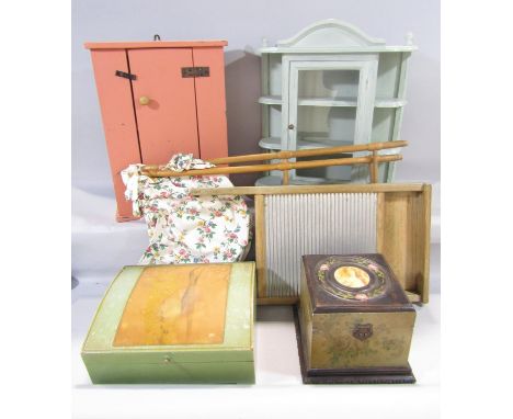 Collection of vintage parlour-ware including washboard, a folding laundry bag, small pink wall cupboard, decorated boxes, and