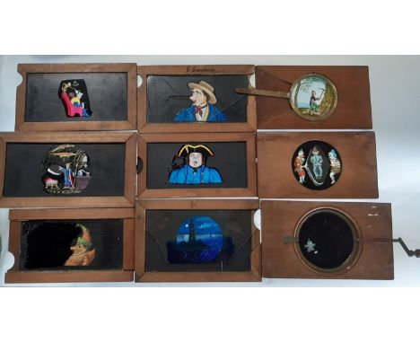 Nine Victorian magic lantern slides, all with moveable action, humorous and others including examples by Carpenter &amp; West