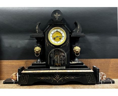A Victorian grand polished black slate and marble mantle clock, 47 cm high, 47cm wide, together with an associated pair of bo