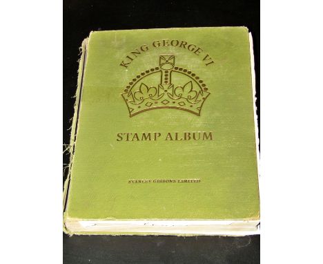 Kind George VI stamp album containing a comprehensive collection of stamps for British Commonwealth issues for the reign of E