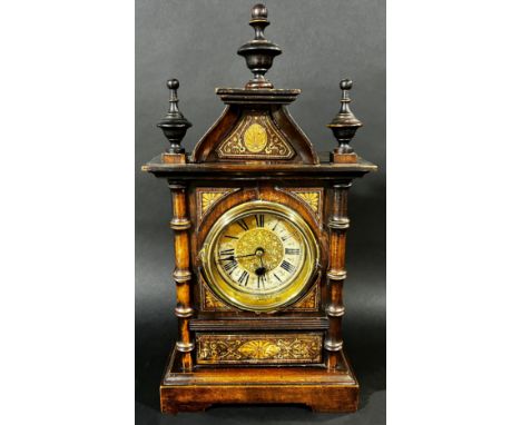 A small late 19th century German mantle clock, architectural form with inlaid case, 42 cm high, 23 cm wide, with pedulum and 