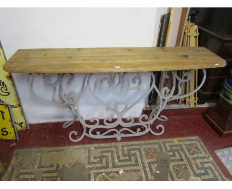 A contemporary steel framed console table, with scrolled detail and bevelled pine top, 81 cm high, 160 x 42cm. Estimate. 