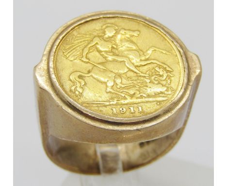 1911 half sovereign mounted in a 9ct ring, size R/S, 13.2g 