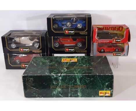 8 large scale boxed models of classic cars including 1:12 Jaguar XJ220 by Maisto, five 1:18 models by Burago including Merced