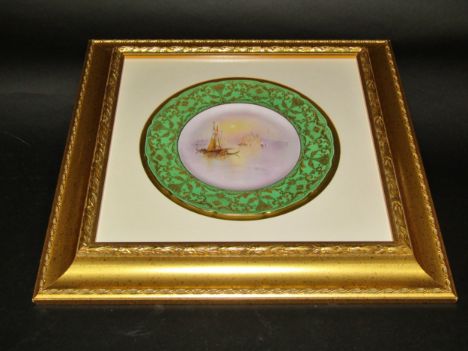 A framed Royal Doulton plate, boats in the lagoon, Venice, signed J Bailey, a porcelain relief of a courting couple in a past
