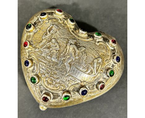 A silver heart shaped trinket box with a wine harvest scene to the centre surrounded by multi coloured cabochon, Chester 1902