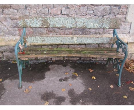 Victorian bench with weathered timber slats (af) raised on decorative vine leaf cast iron end supports (slats for recommissio