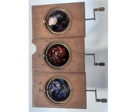 Three Victorian magic lantern crank revolving scenes, The fire at Exeter Theatre on 5th September 1887, which resulted in the
