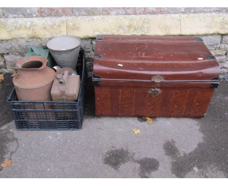A vintage tin trunk with simulated wood grained finish, together with a small collection of vintage oil and petrol cans to in