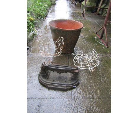 Small 19th century cast iron boot scraper with tray base, together with a weathered terracotta planter, 43cm diameter x 36cm 