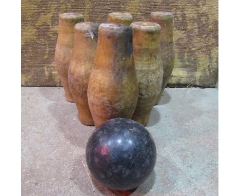 six small vintage skittle pins and ball together with a further vintage stained wooden toolbox with partially fitted interior