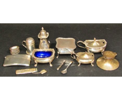 A mixed selection of silverware including five assorted condiments, a card case, a squat inkwell, a trinket box, a cigarette 