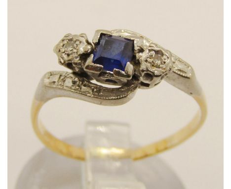 Art Deco style square-cut sapphire and diamond crossover ring, marks worn but probably 18ct, size K/L, 2g 