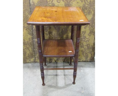 Late Victorian mahogany two tier square cut occasional table in the manner of E W Godwin, raised on ring turned and tapered s