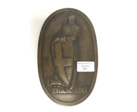 WW1 British Royal Navy Oval Gunmetal ships Wardroom badge from "HMS Champion" depecting St. George with the banner title of t