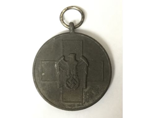 WW2 Third Reich Deutscher Volkspflege German Social Welfare medal. Late war Zinc example. No ribbon. No makers marks to ring.