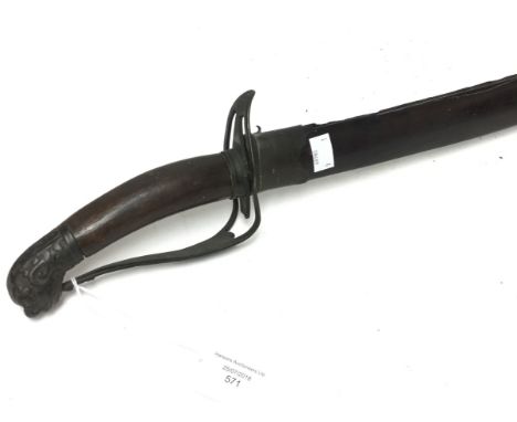 Vietnamese officer's saber with Lions Head Pommel, wooden grip with guard (a/f). 66cm single edged blade with double fuller. 