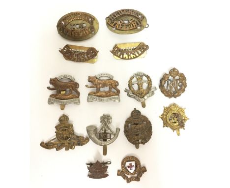 WW1 & WW2 British cap badges to include: WW1 Tank Corps: Leicester Regt cap badges x 2 (One Brooch pinned) Pair of Leicester 